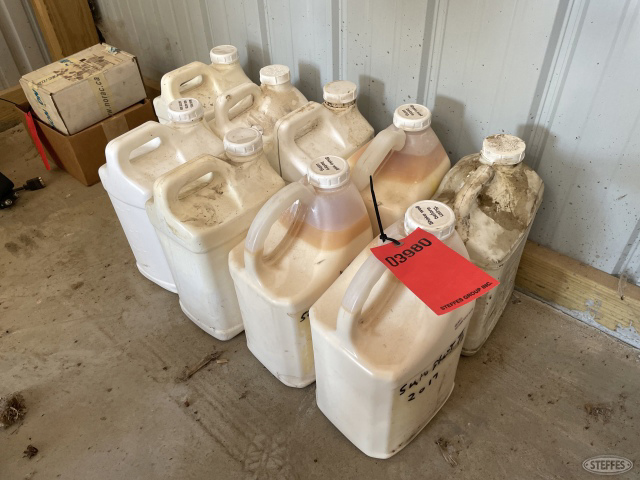 (9) Jugs of misc. farm chemicals